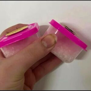 Two small containers of bath salts